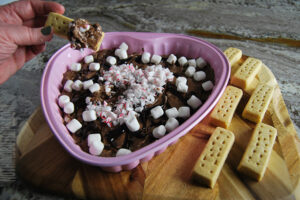 hot cocoa dip being served with shortbread cookies