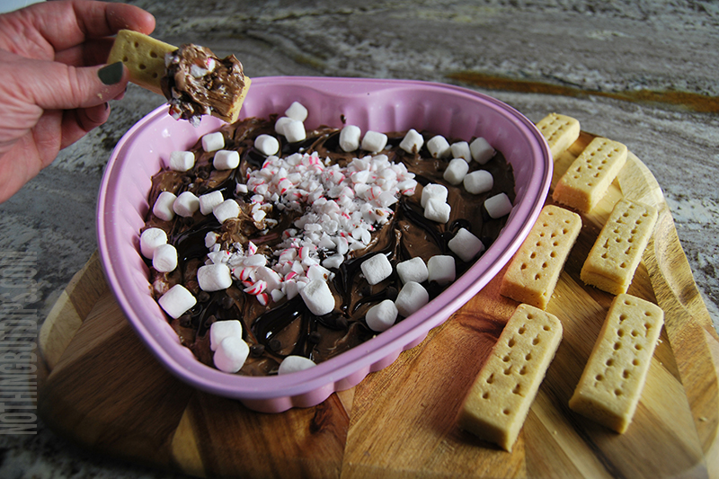hot cocoa dip being served with shortbread cookies