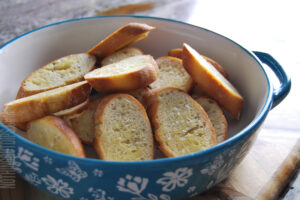 Garlic toasties heaped in a bowl