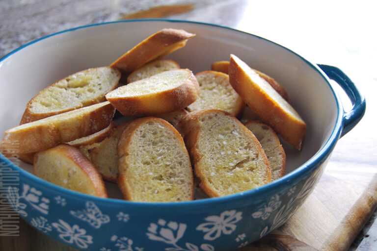 Garlic toasties heaped in a bowl