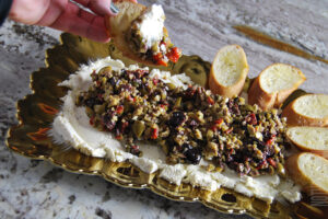 Boursin and Olive Tapenade Cip being served with crusty garlic bread