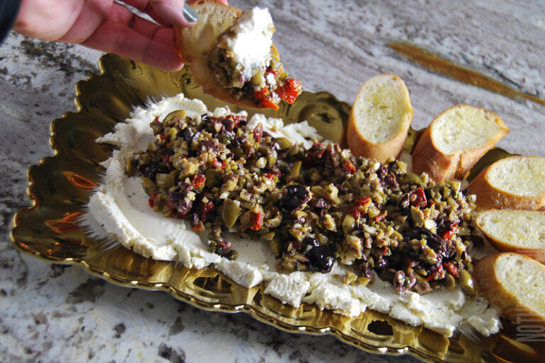 Boursin and Olive Tapenade Cip being served with crusty garlic bread