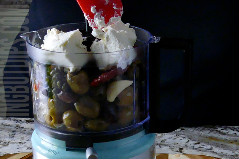 add cream cheese to the olive puree ingredients in the food processor