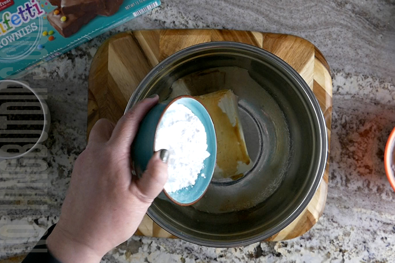 add powdered sugar to the brownie bites dip