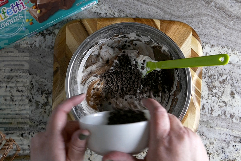 stir mini chocolate chips into the brownie bites dip