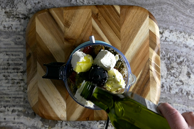 add extra virgin olive oil to the olive puree ingredients in the food processor