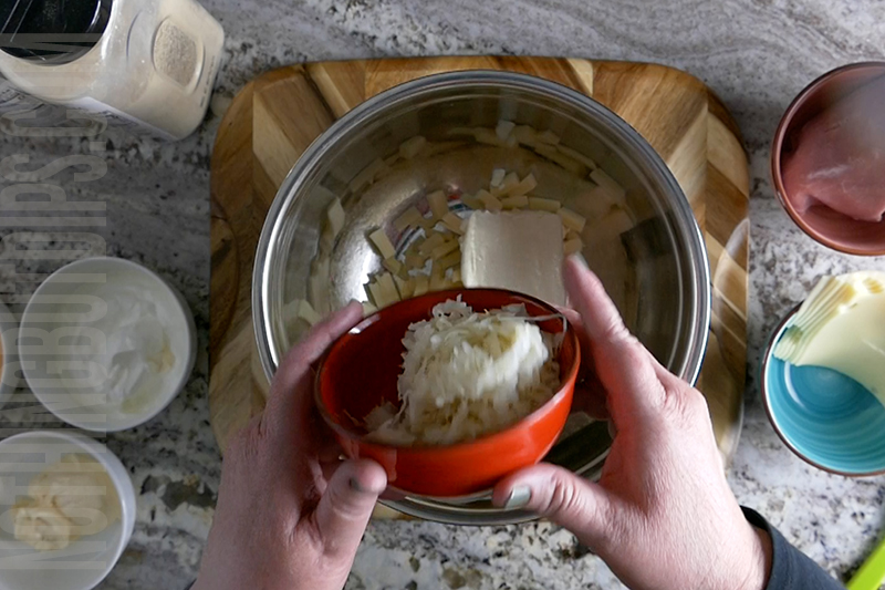 adding sauer kraut to the Reuben dip