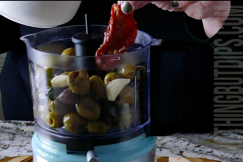 add sun dried tomatoes to the food processor