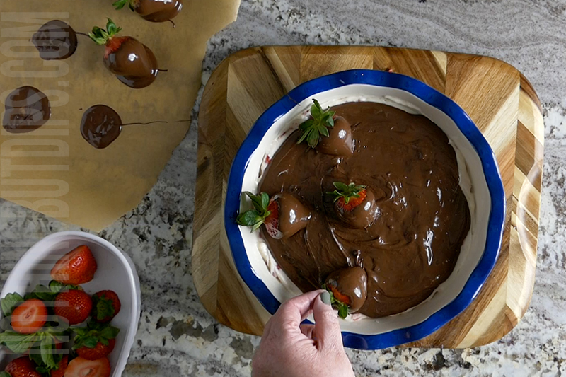 Add chocolate covered strawberries to the top of the chocolate covered strawberries dip