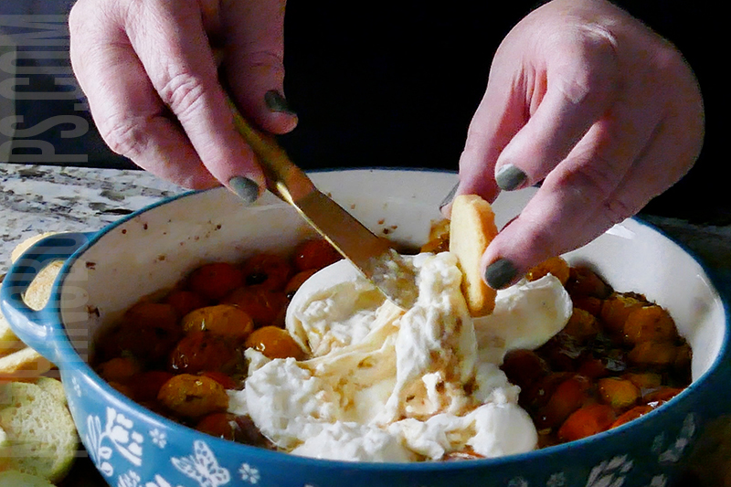 roasted tomato and burrata dip served on a cracker