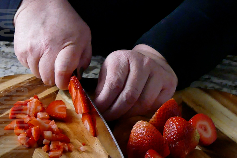 chopping strawberries