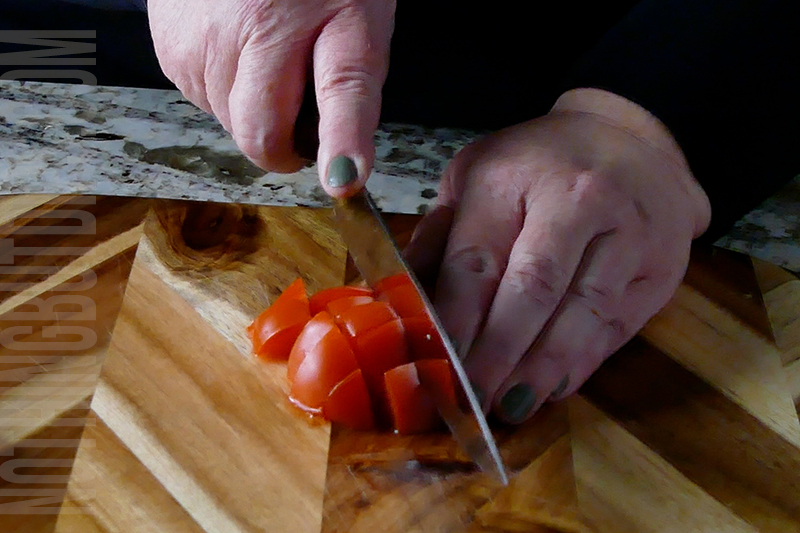 chopping tomatoes