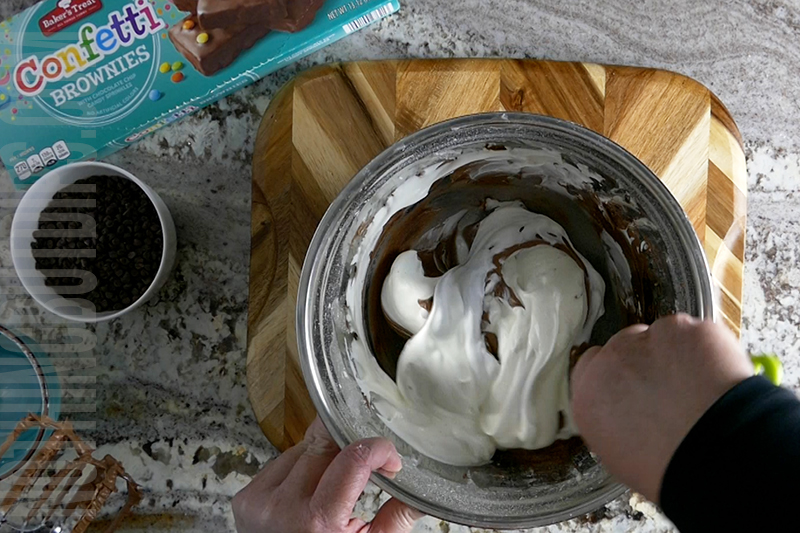 fold the whipped cream into the chocolate mixture