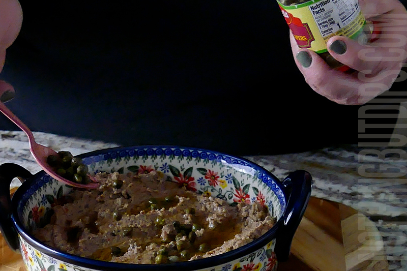 garnish the olive puree with capers