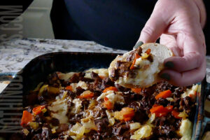 Delicious pot roast dip served on crusty bread