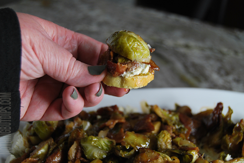 Boursin with brussels and bacon dip served on a toast crisp