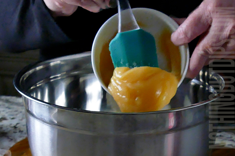 adding lemon curd to the dip mixture