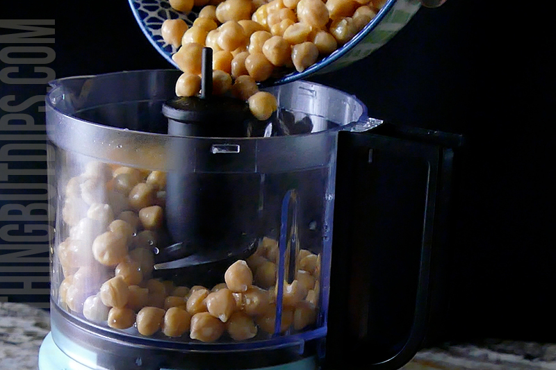 add chickpeas to the food processor to create lemon garlic hummus