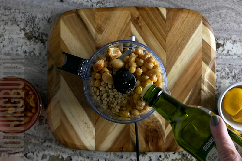 drizzle olive oil into the min food processor to create lemon garlic hummus