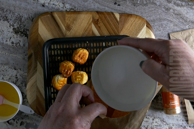 adding sugar to a paper lunch bag