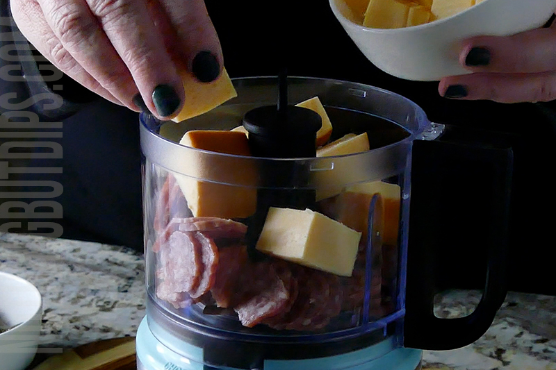 adding smoked cheese to the mini food processor