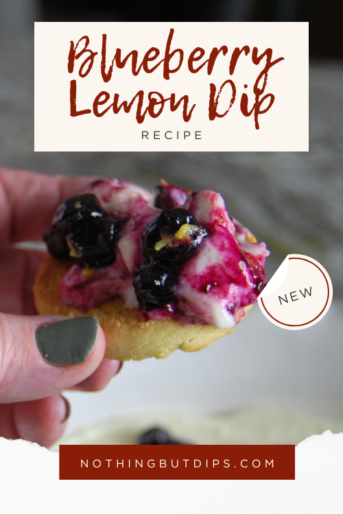 creamy blueberry and lemon dip being served on a shortbread cookie