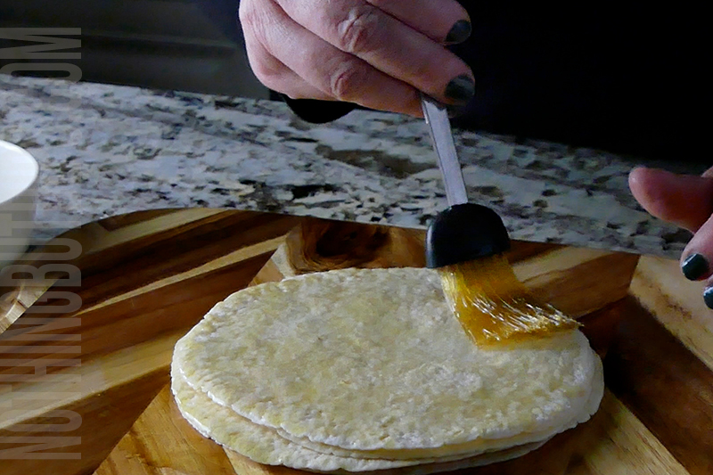 brush olive oil on the tortillas