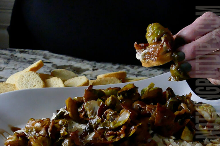 Boursin with brussels and bacon dip served on a toast crisp