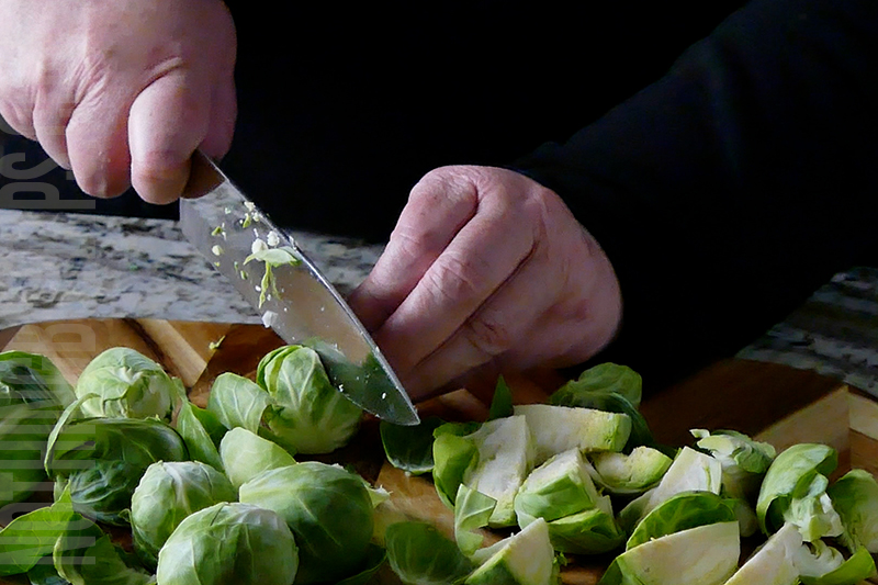 chopping brussel sprouts for Boursin with brussels and bacon dip