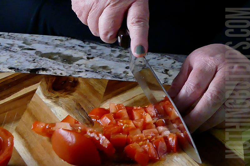 chopping tomatoes