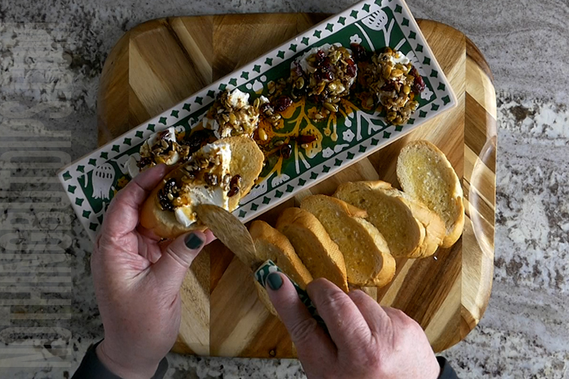 easy and delicious marinated goat cheese dip served on a garlic toastie