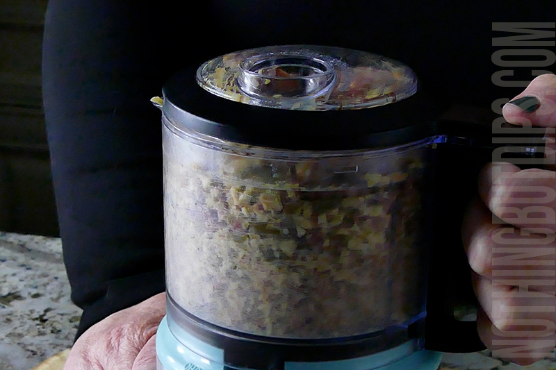 pureeing the salami and cheese pate in a mini food processor