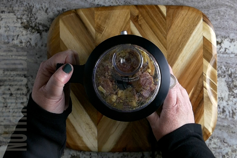 pureeing the salami and cheese pate in a mini food processor