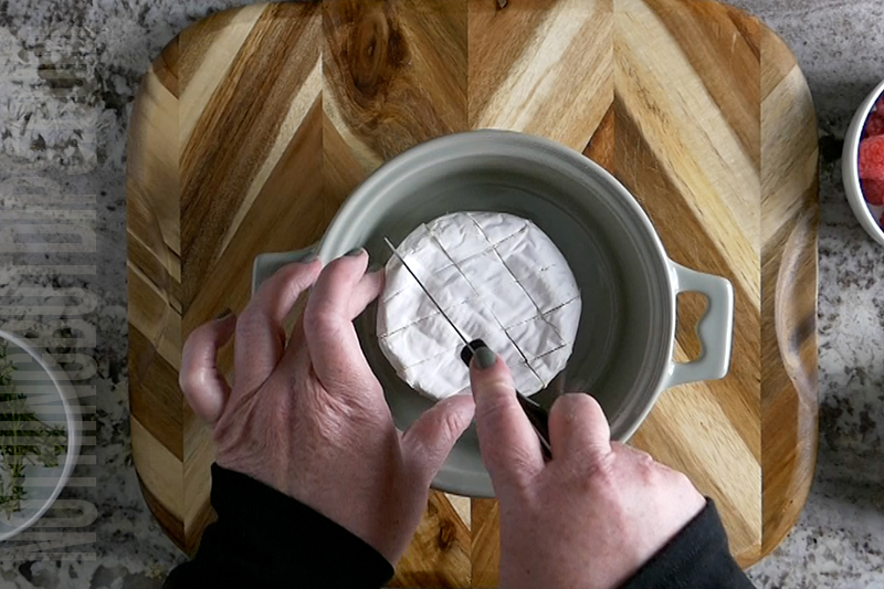 scoring a wheel of brie