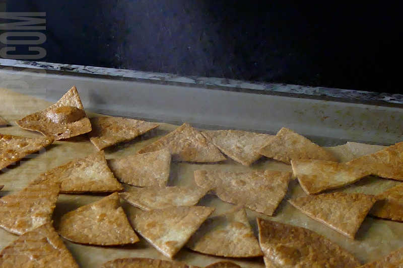 spray cooking spray onto the baked tortilla chips