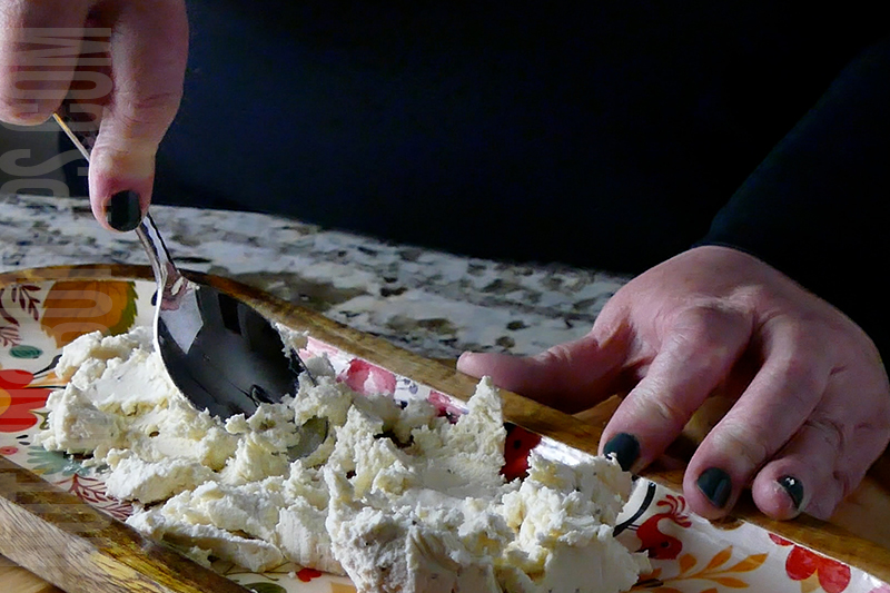 spread the Boursin cheese on the tray