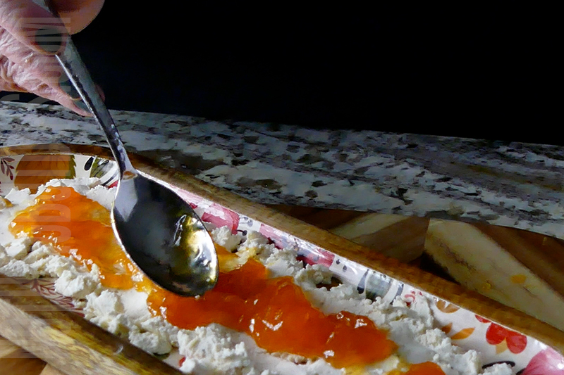 add apricot jam to the top of the Boursin cheese