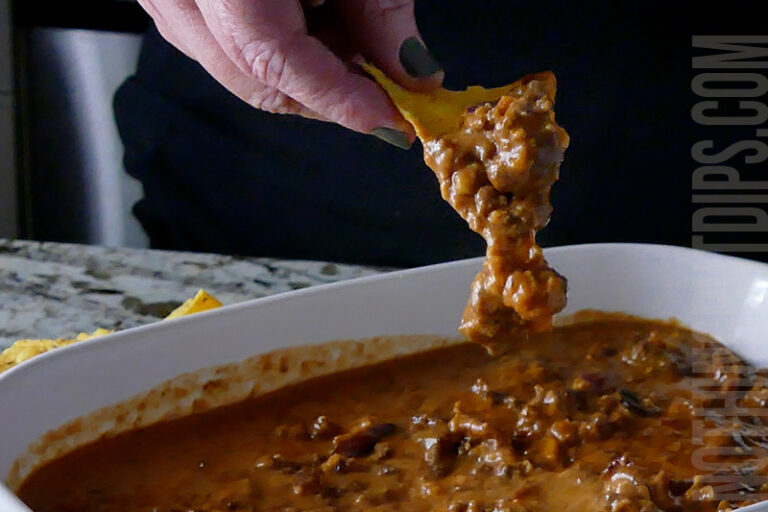 sweet and sour beef and cheese dip (aka put a ring on it cheese dip) served on a tortilla