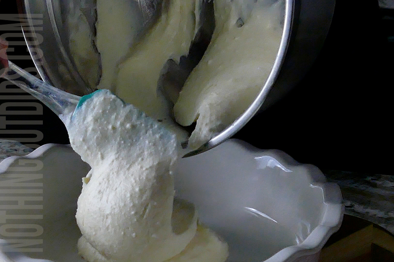 transferring the lemon cream mixture to a pie plate to form the base for our blueberry and lemon dip