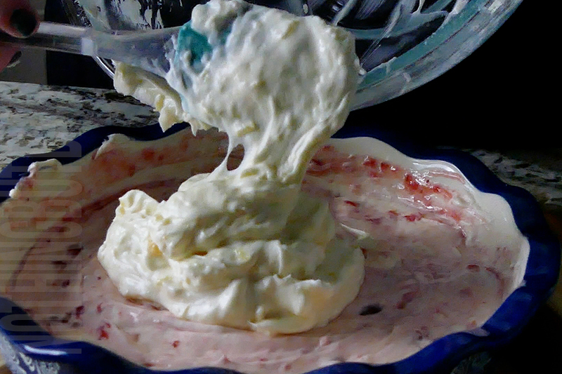 mixing pineapple sundae topping into the creamy base for the banana split dip