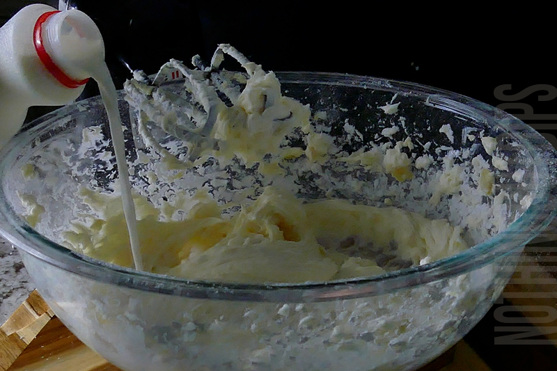 adding milk to the base for the cookies and milk dip