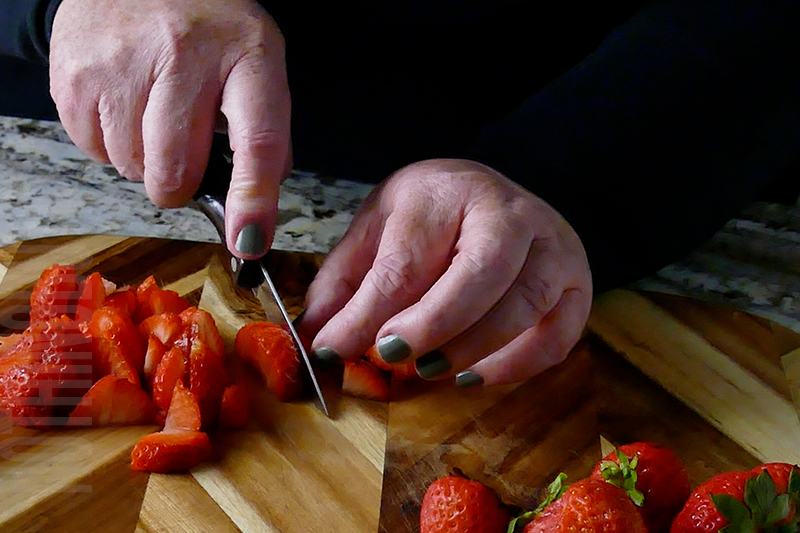 cutting strawberries