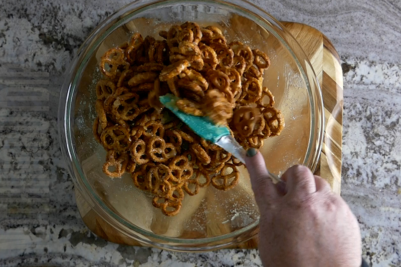 mix the pretzels now that the melted butter and sugar have been added