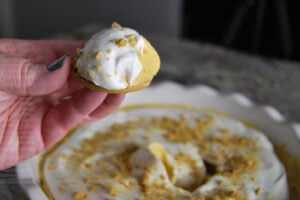creamy pumpkin cheesecake dip served on a shortbread cookie