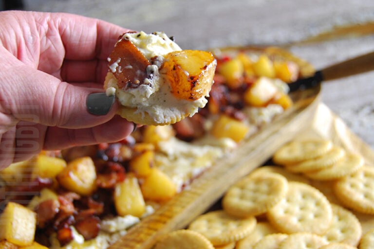 Boursin with Bacon and Grilled Pineapple Appetizer Served on a cracker