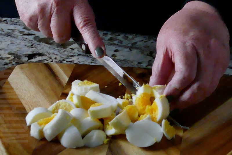 chopping boiled eggs