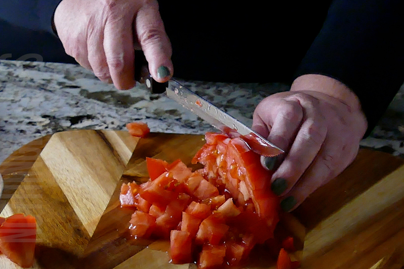 chopping tomatoes